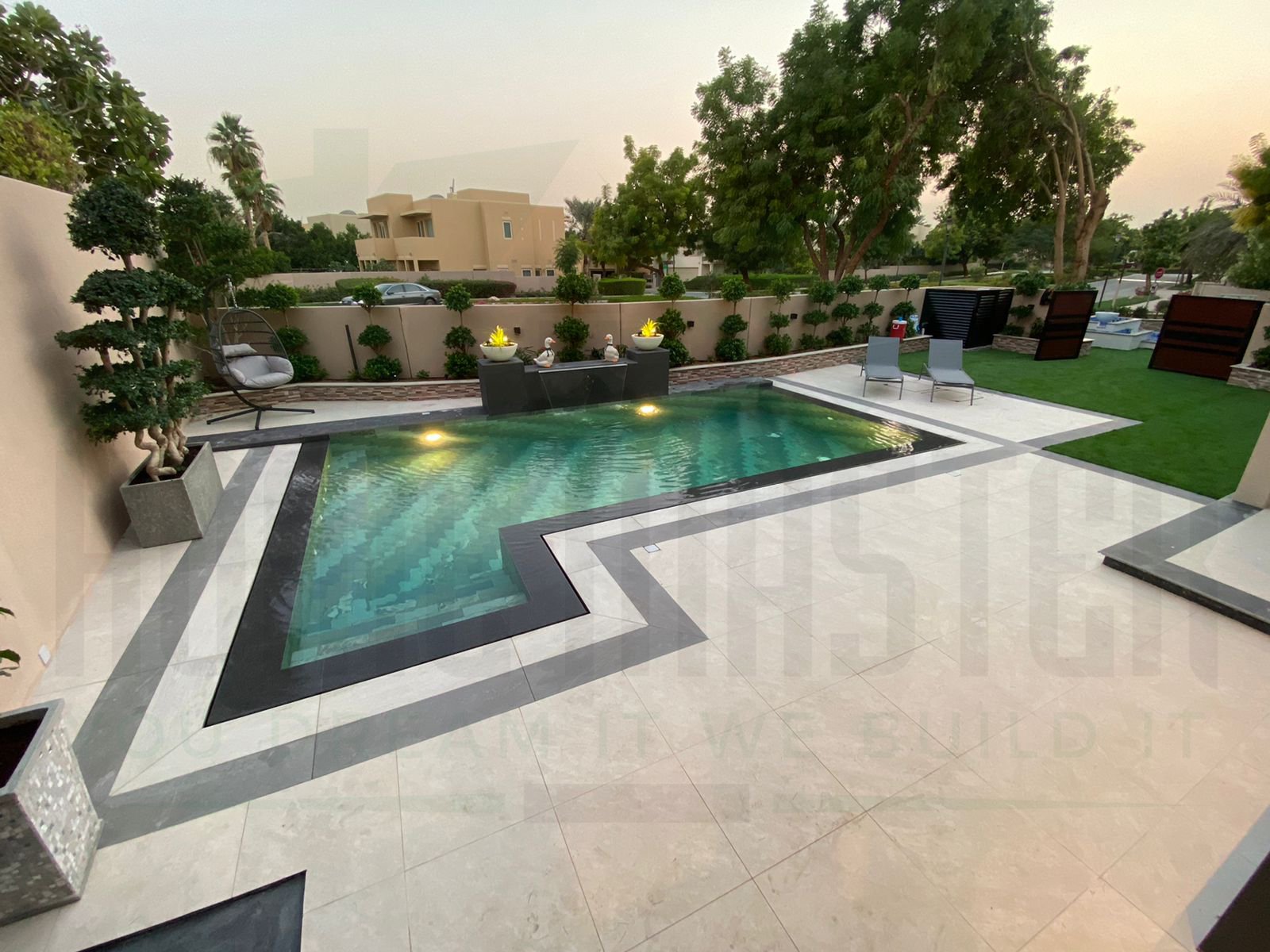 Landscaped family pool by Dubai pool builders